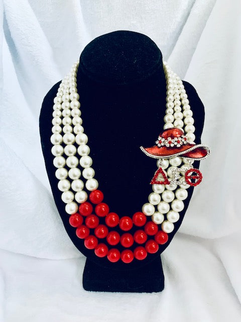 Red and white pearl on sale necklace